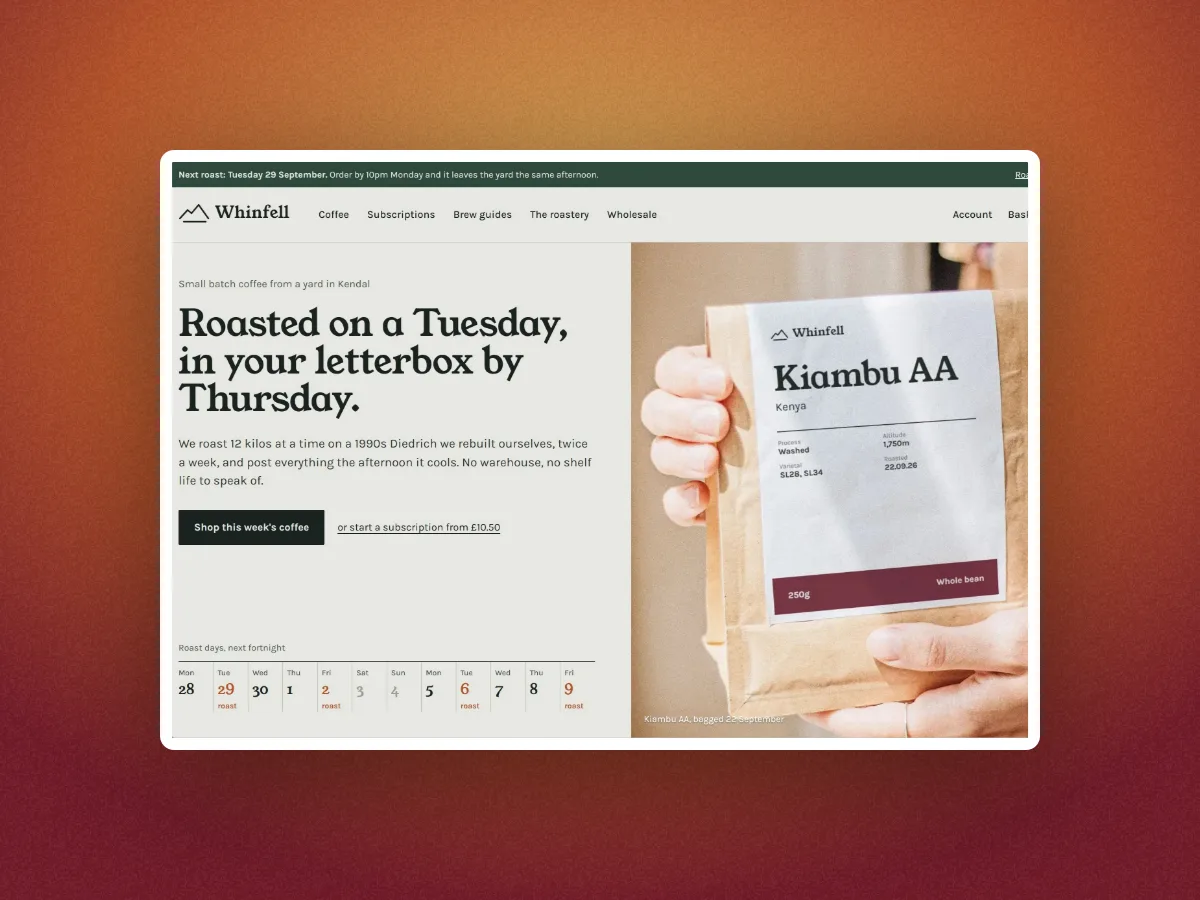 The Whinfell Roasters homepage with no device, in a thick white mat on rust orange paper